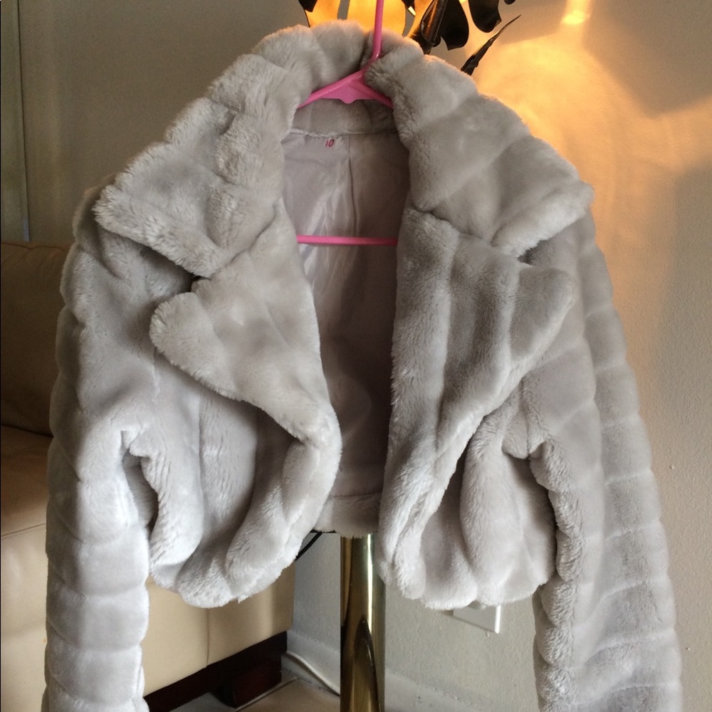 Faux fur waist length jacket.